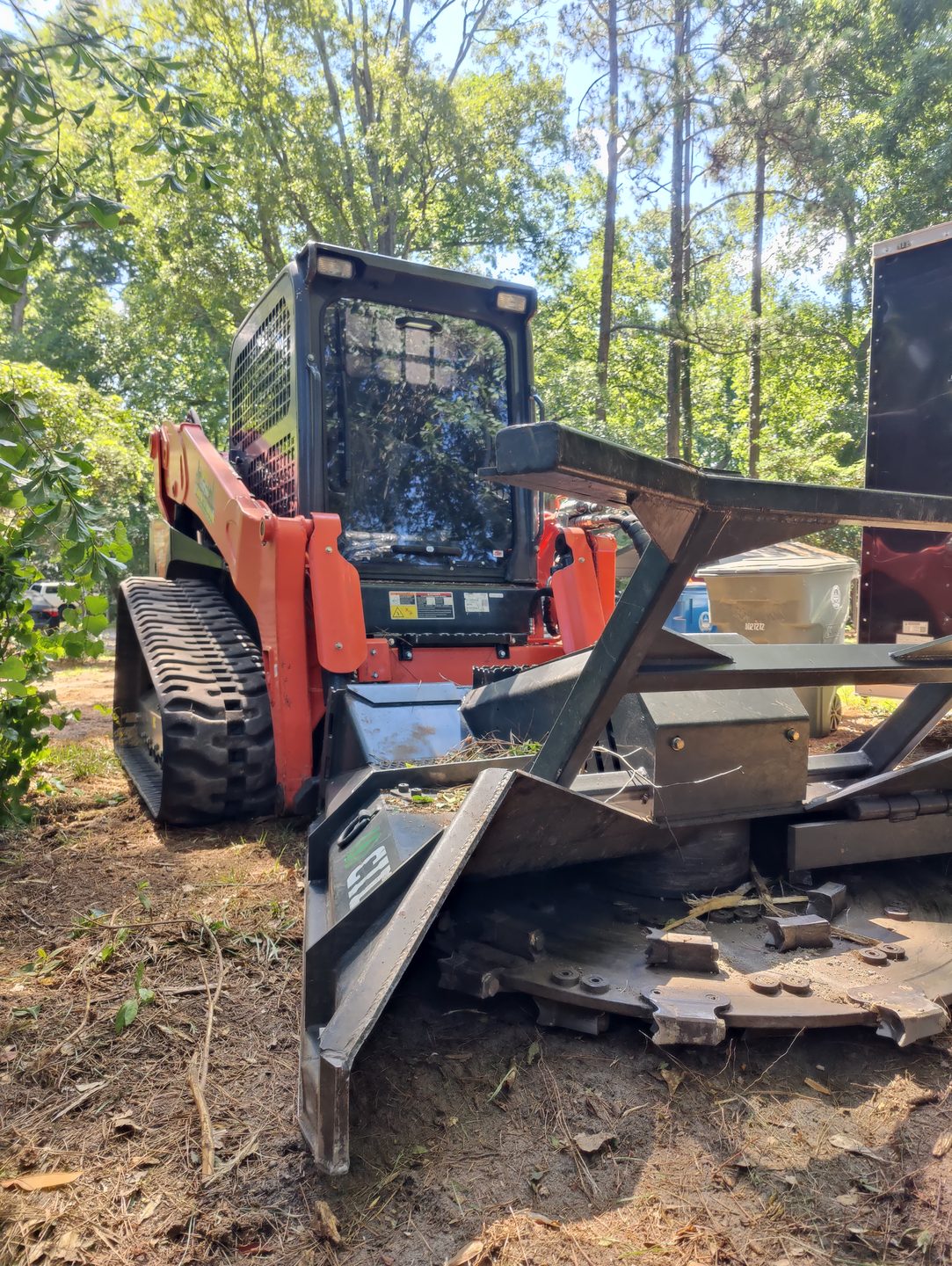 Track loader with mulcher attachment — Knock'Em Down Solutions field equipment